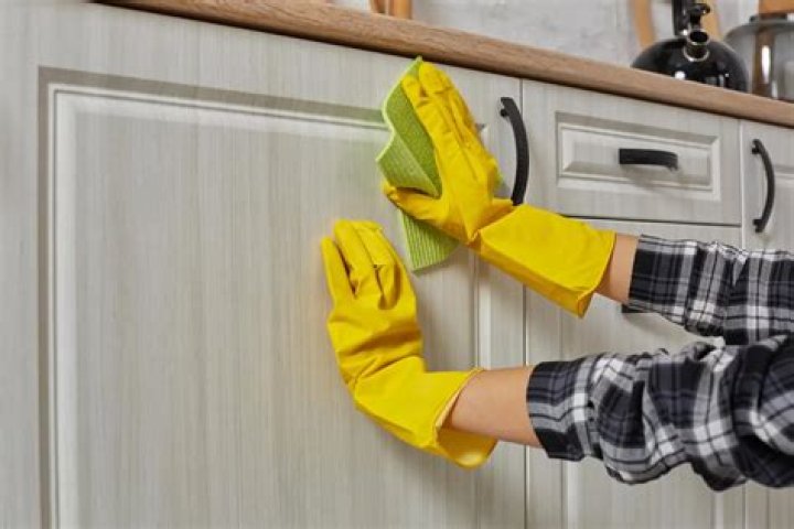 cleaning kitchen cabinets