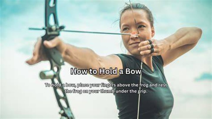 Quick Answer: How To Hold Bow And Arrow